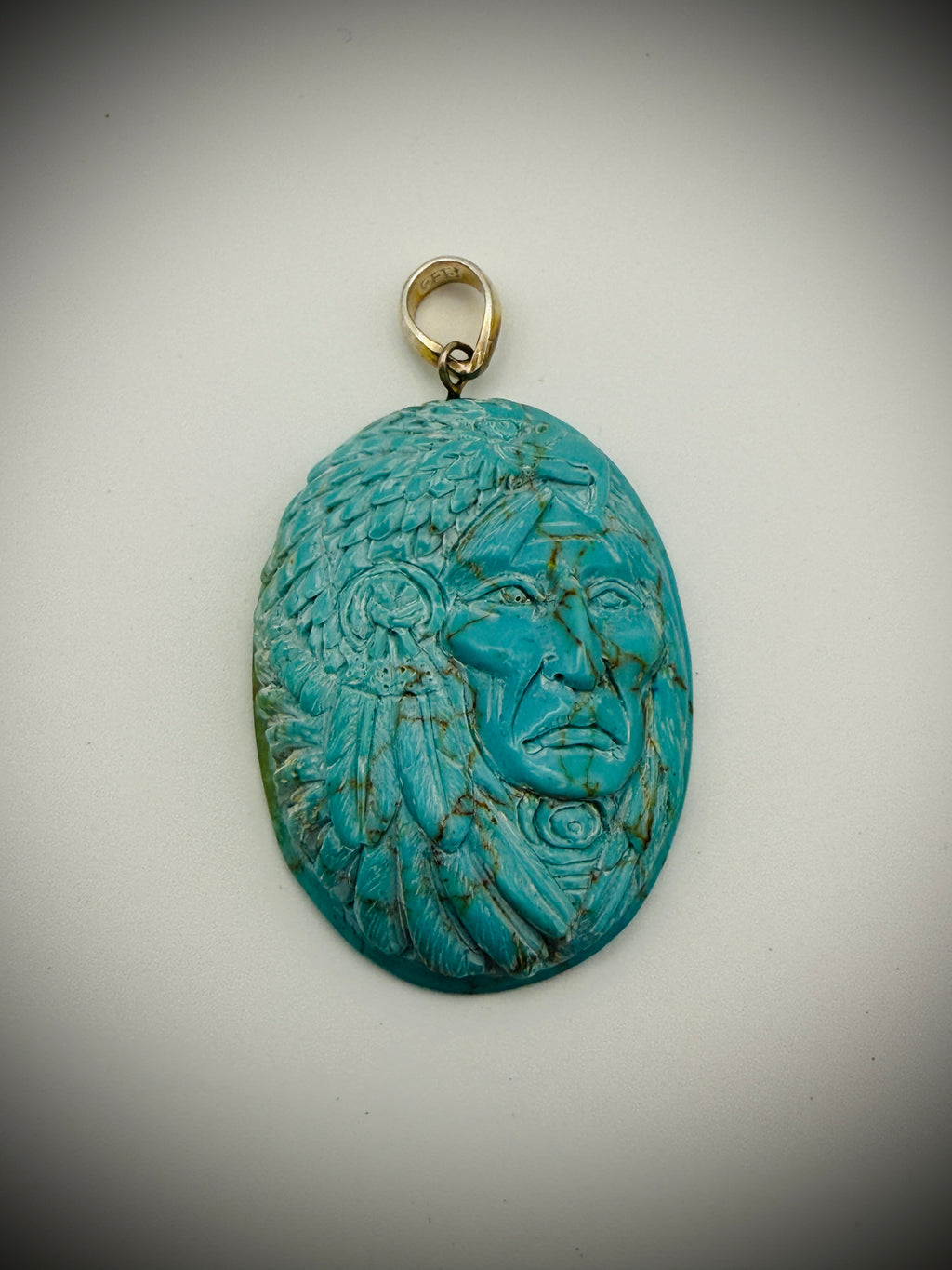 Carved Turquoise Chief Pendant - 15g - 925 bail