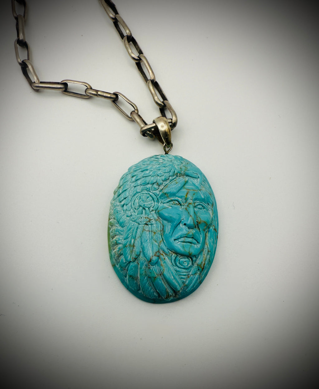 Carved Turquoise Chief Pendant - 15g - 925 bail