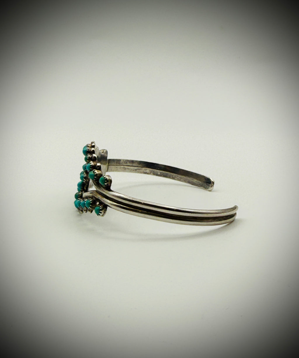Vintage Zuni Sterling Snake-Eye Turquoise Cuff — artist-stamped HRG