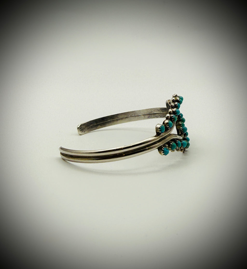 Vintage Zuni Sterling Snake-Eye Turquoise Cuff — artist-stamped HRG