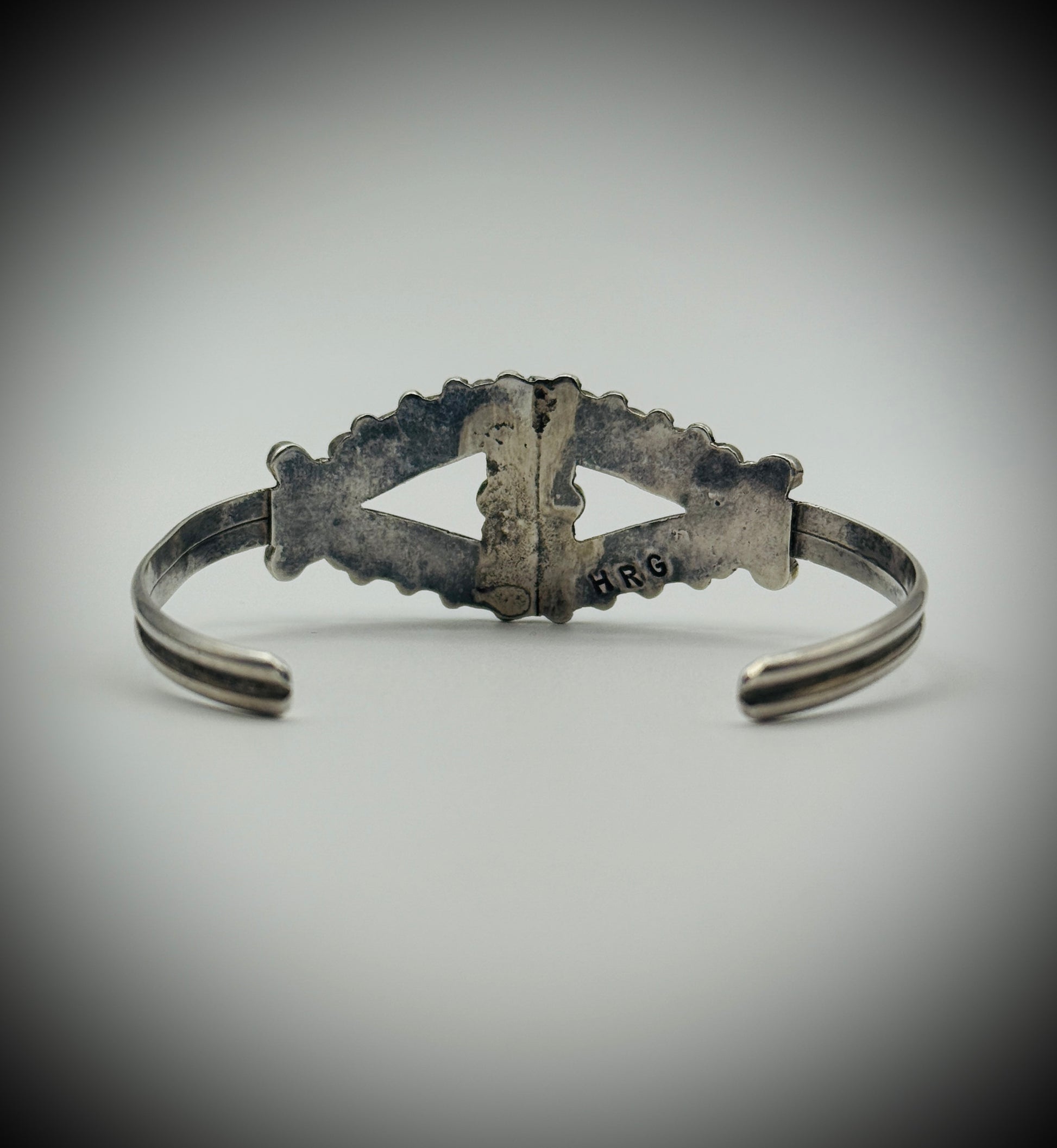 Vintage Zuni Sterling Snake-Eye Turquoise Cuff — artist-stamped HRG