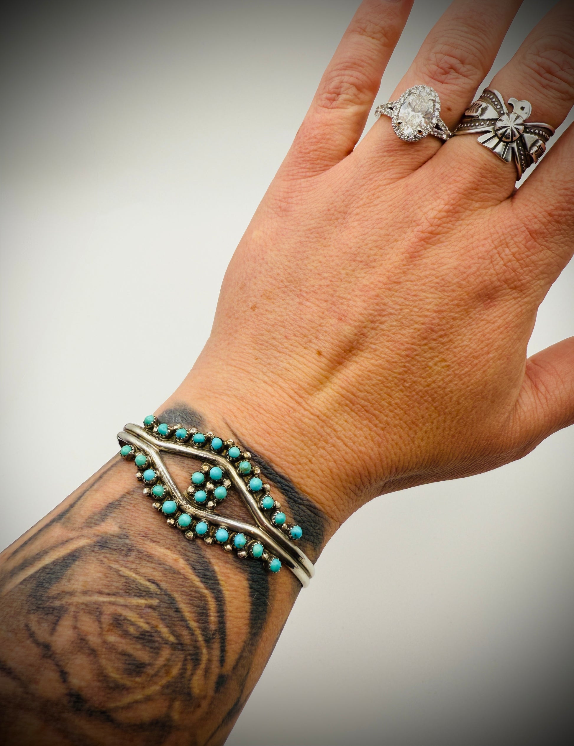 Vintage Zuni Sterling Snake-Eye Turquoise Cuff — artist-stamped HRG